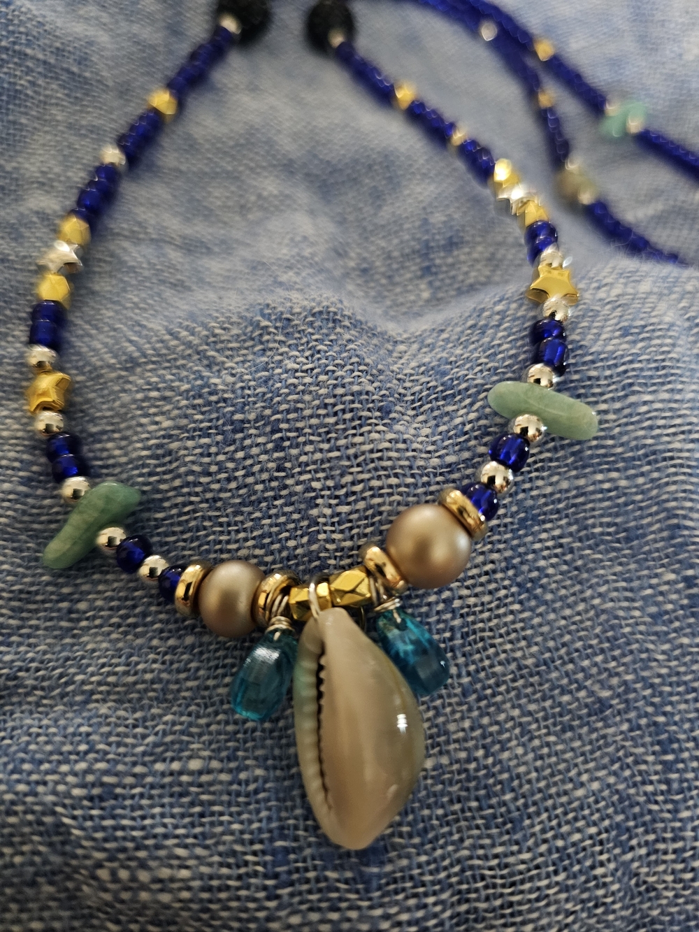 Handmade Blue Beaded Shell Pendant Necklace with Gold Accents